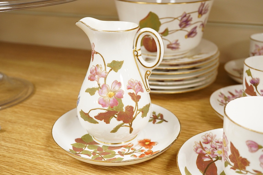 A late Victorian Royal Worcester floral decorated tea service, milk jug 13cm high.
